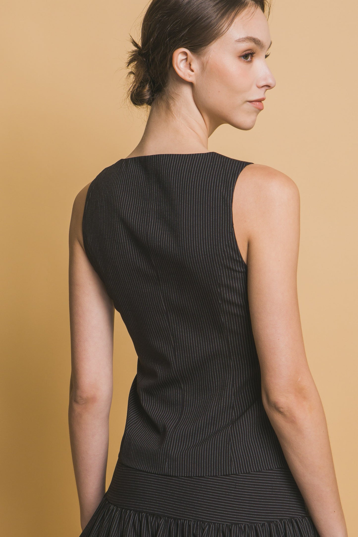 Chaleco Sastre con Botones y Corte Entallado