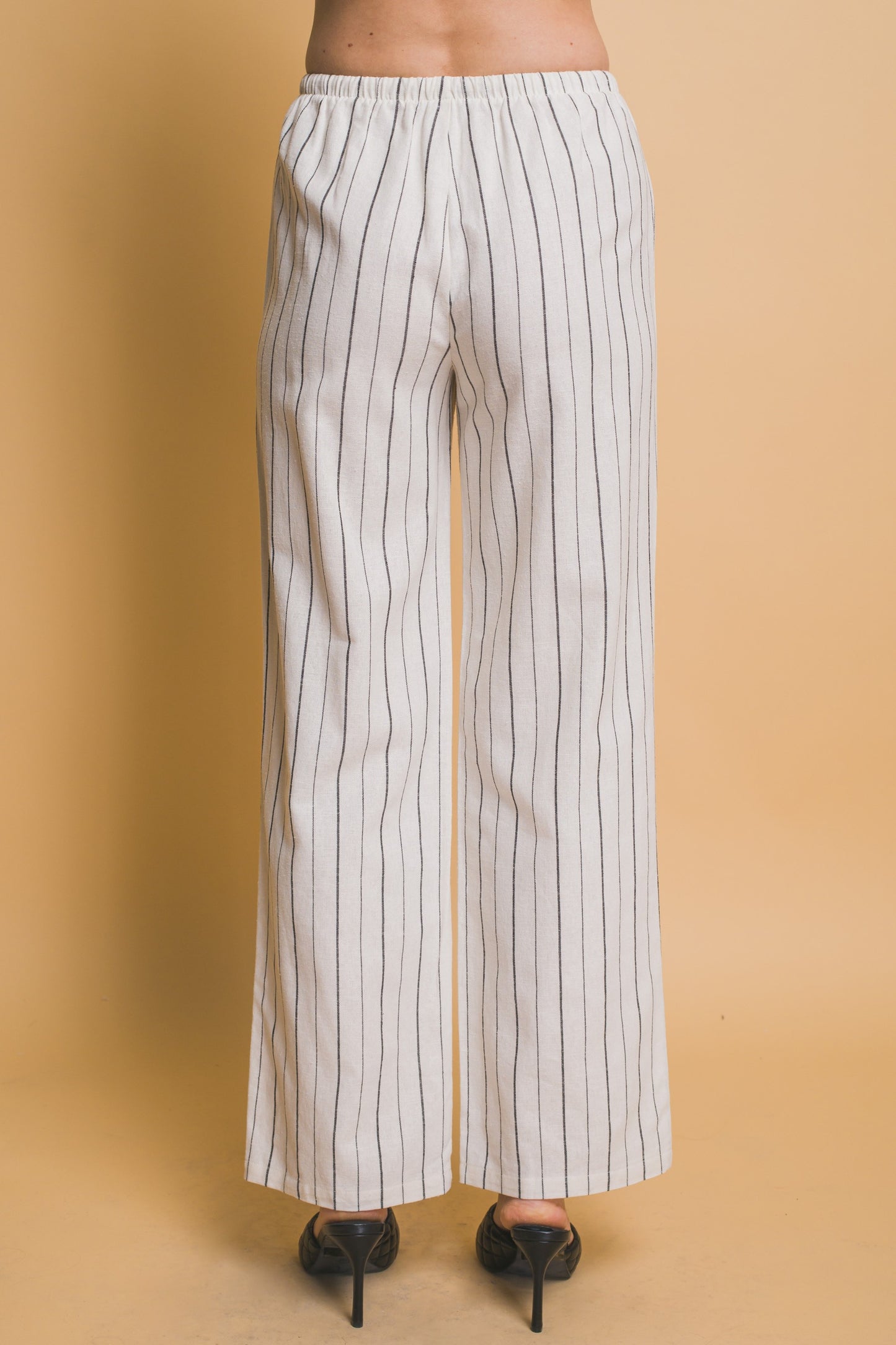 Pantalón recto de rayas con pretina elástica