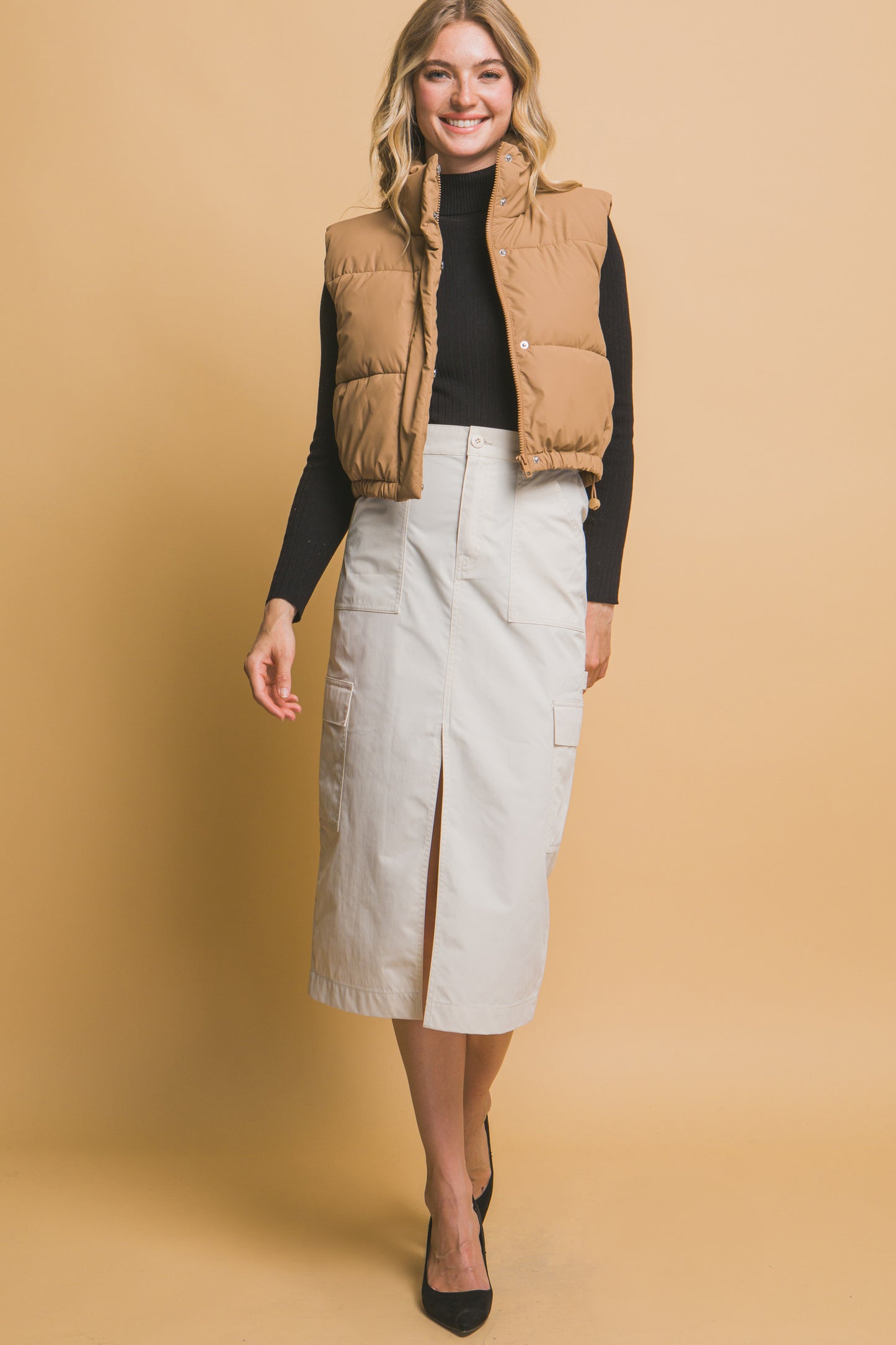 Chaleco acolchado con cuello alto y ajuste en cintura
