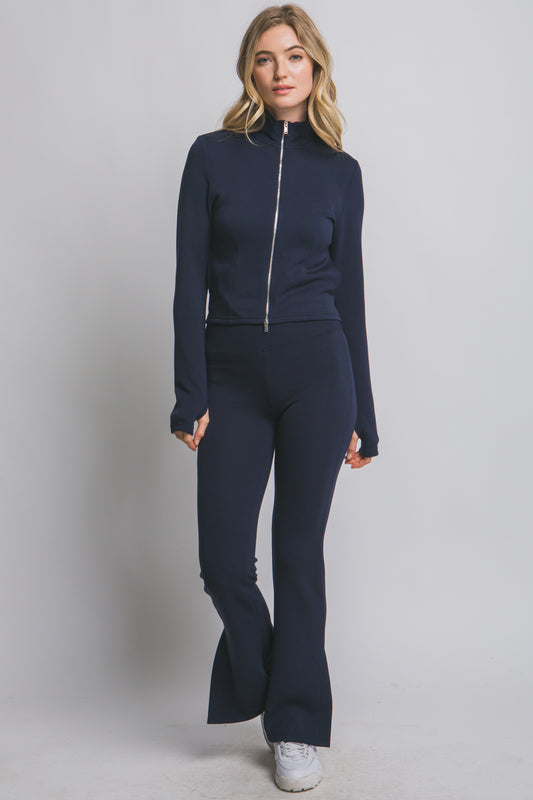 Chamarra deportiva con cierre metálico y ajuste entallado