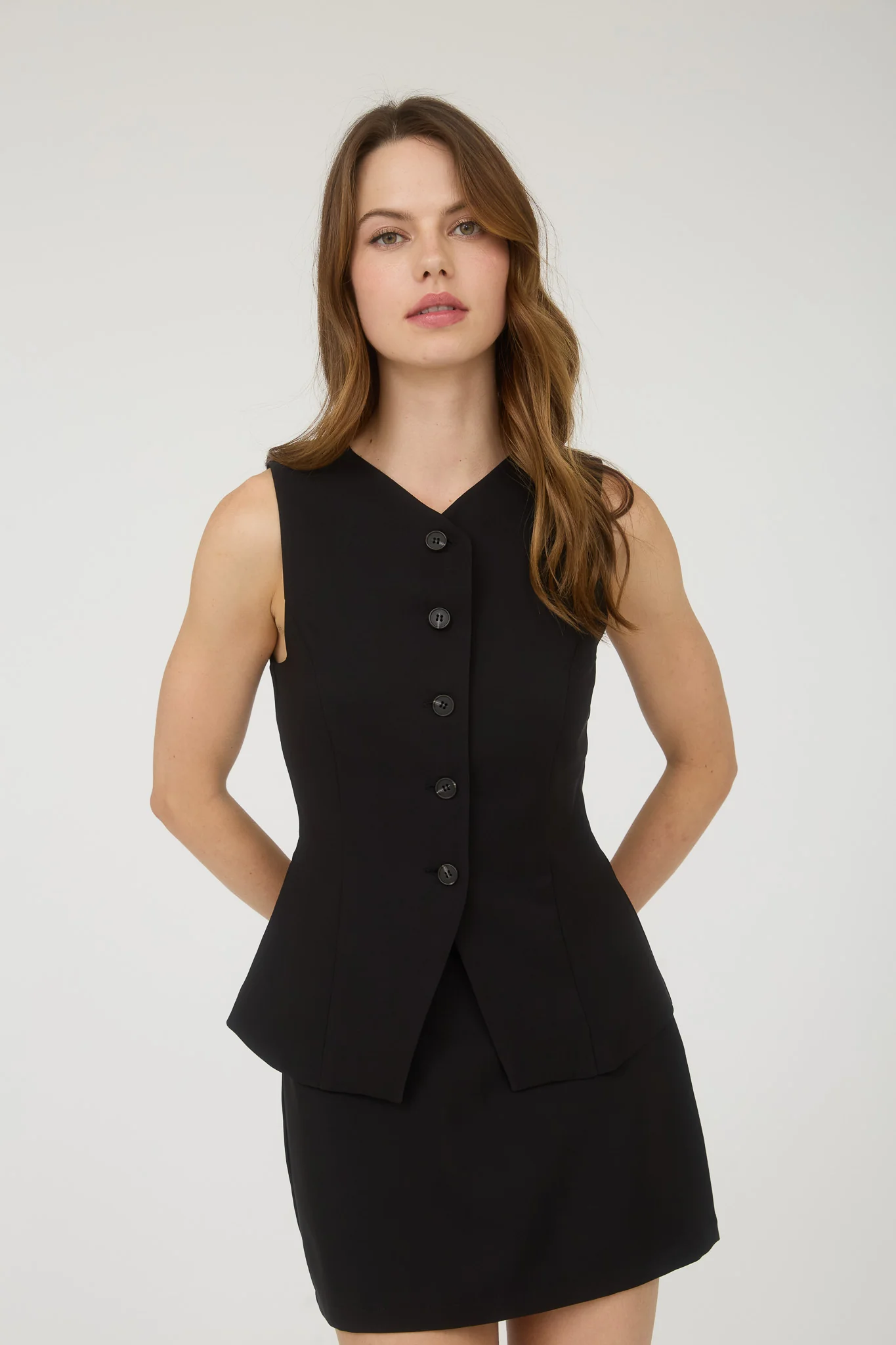Blusa sin mangas con escote cuadrado y frunces laterales