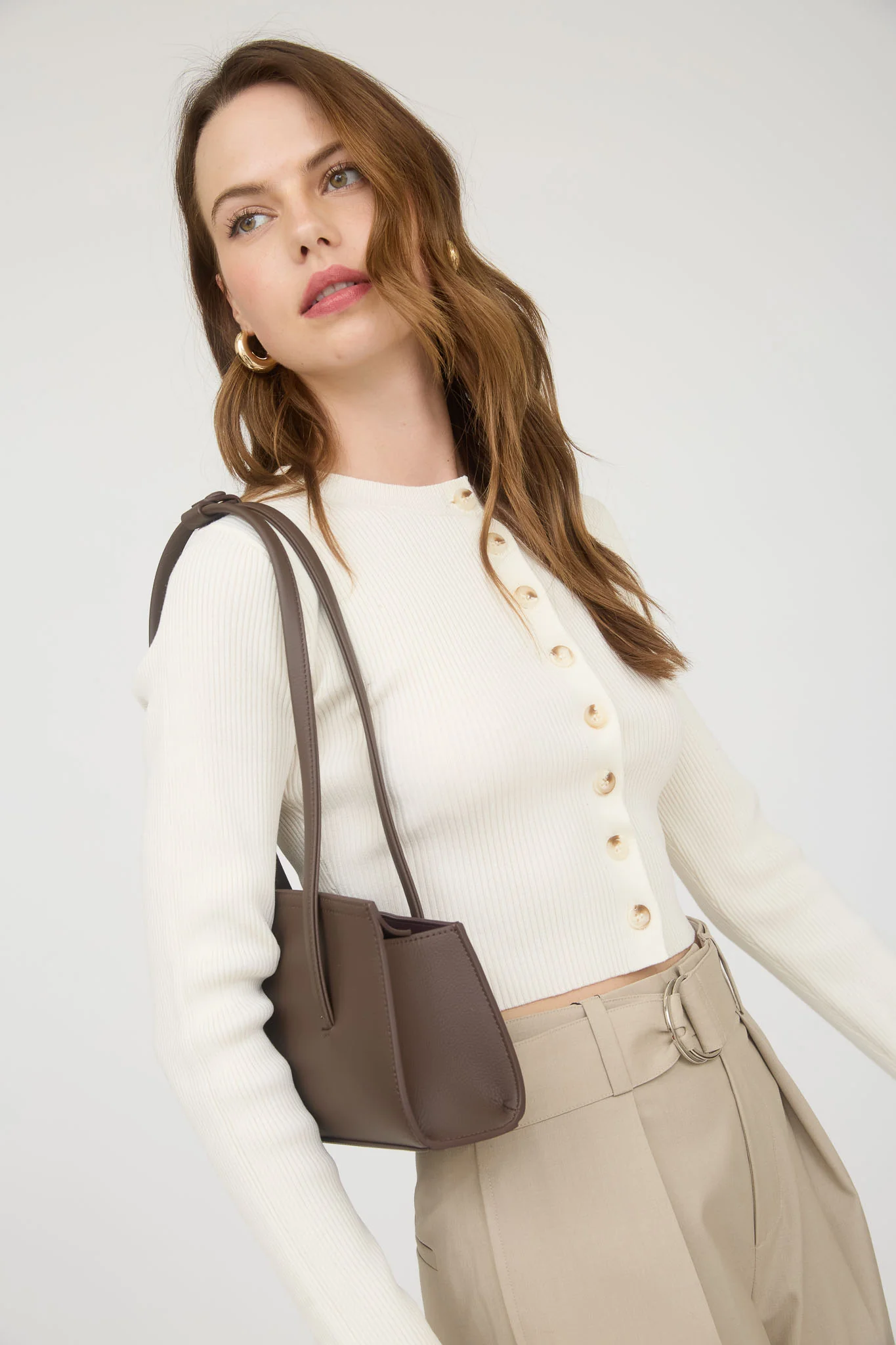 Blusa manga larga corte ajustado con botones
