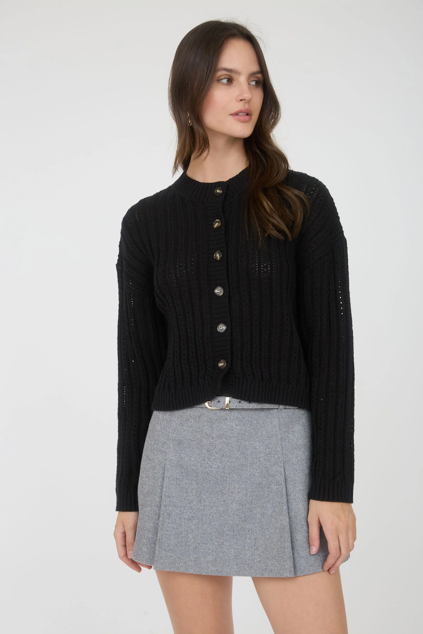 Suéter tejido abierto con botones frontales