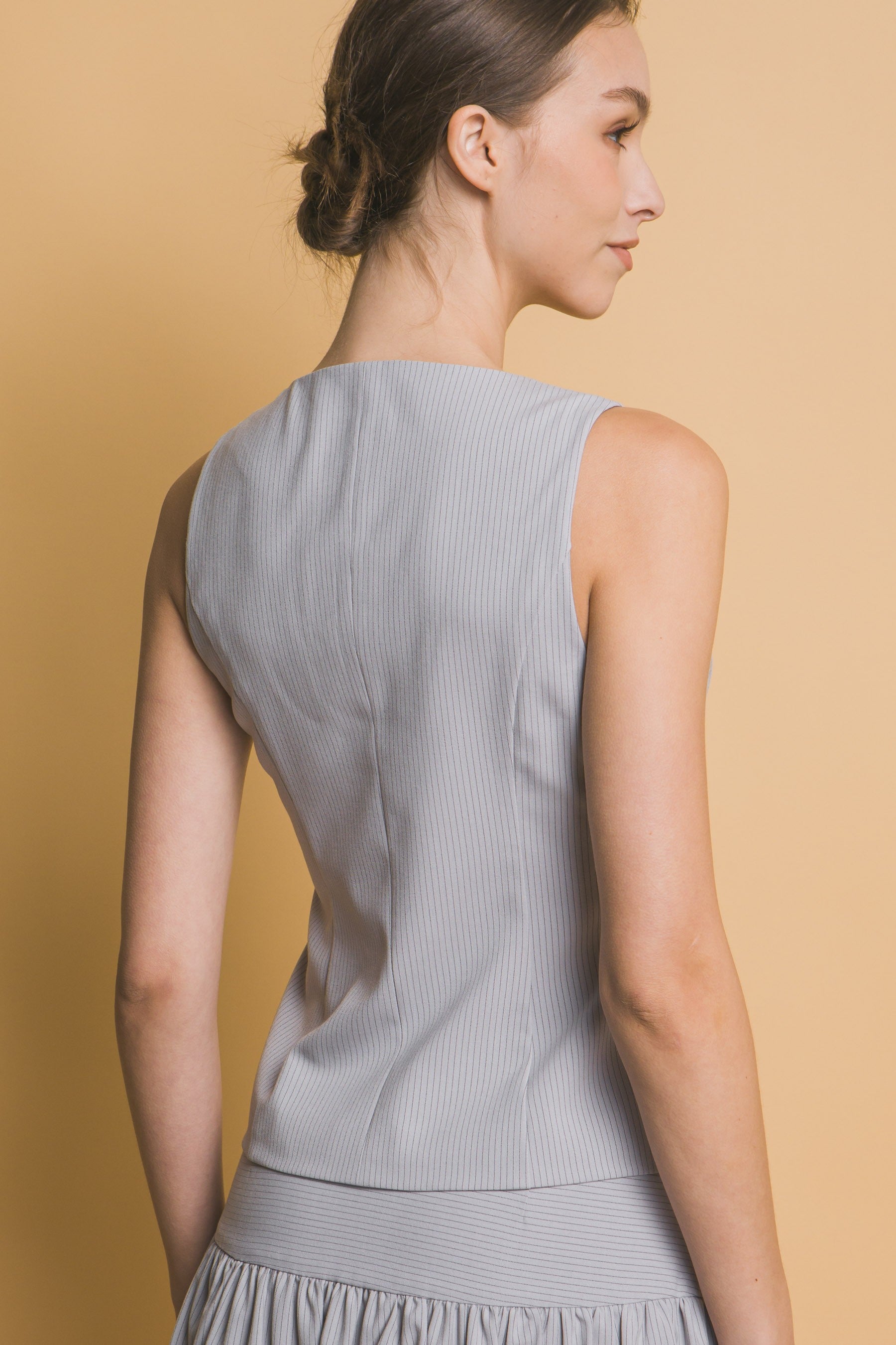 Chaleco Sastre con Botones y Corte Entallado