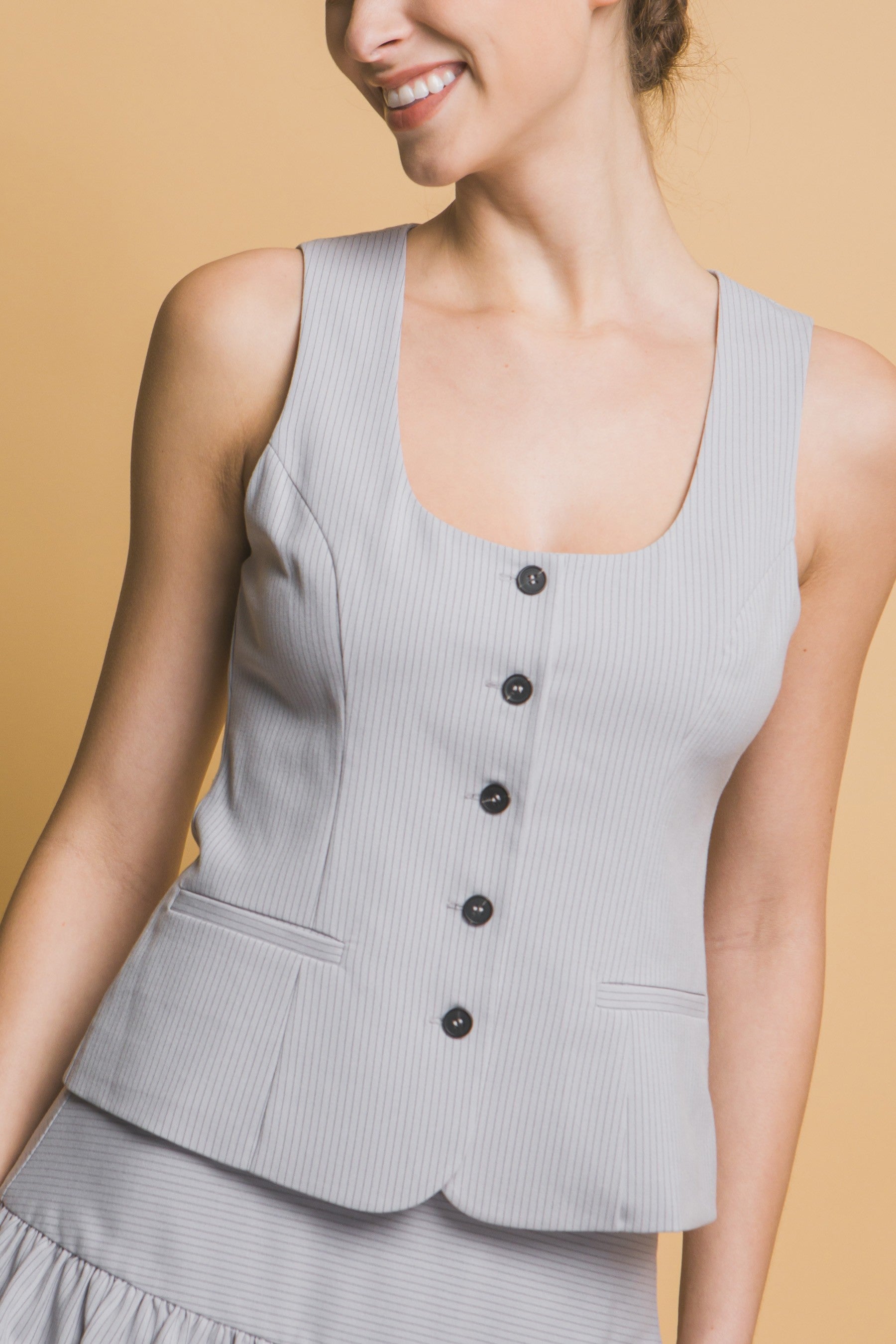 Chaleco Sastre con Botones y Corte Entallado