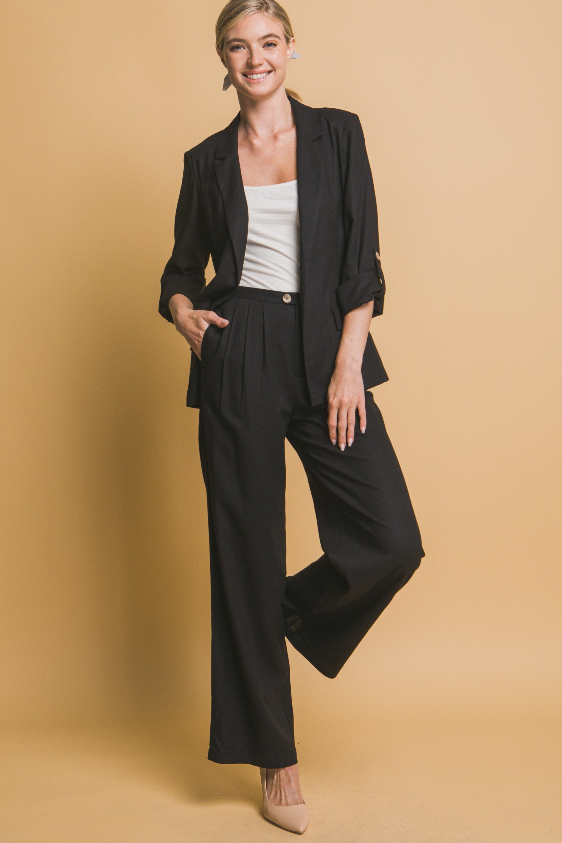 Pantalón palazzo de tiro alto con pinzas
