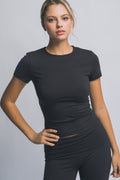 Blusa deportiva de manga corta con ajuste stretch