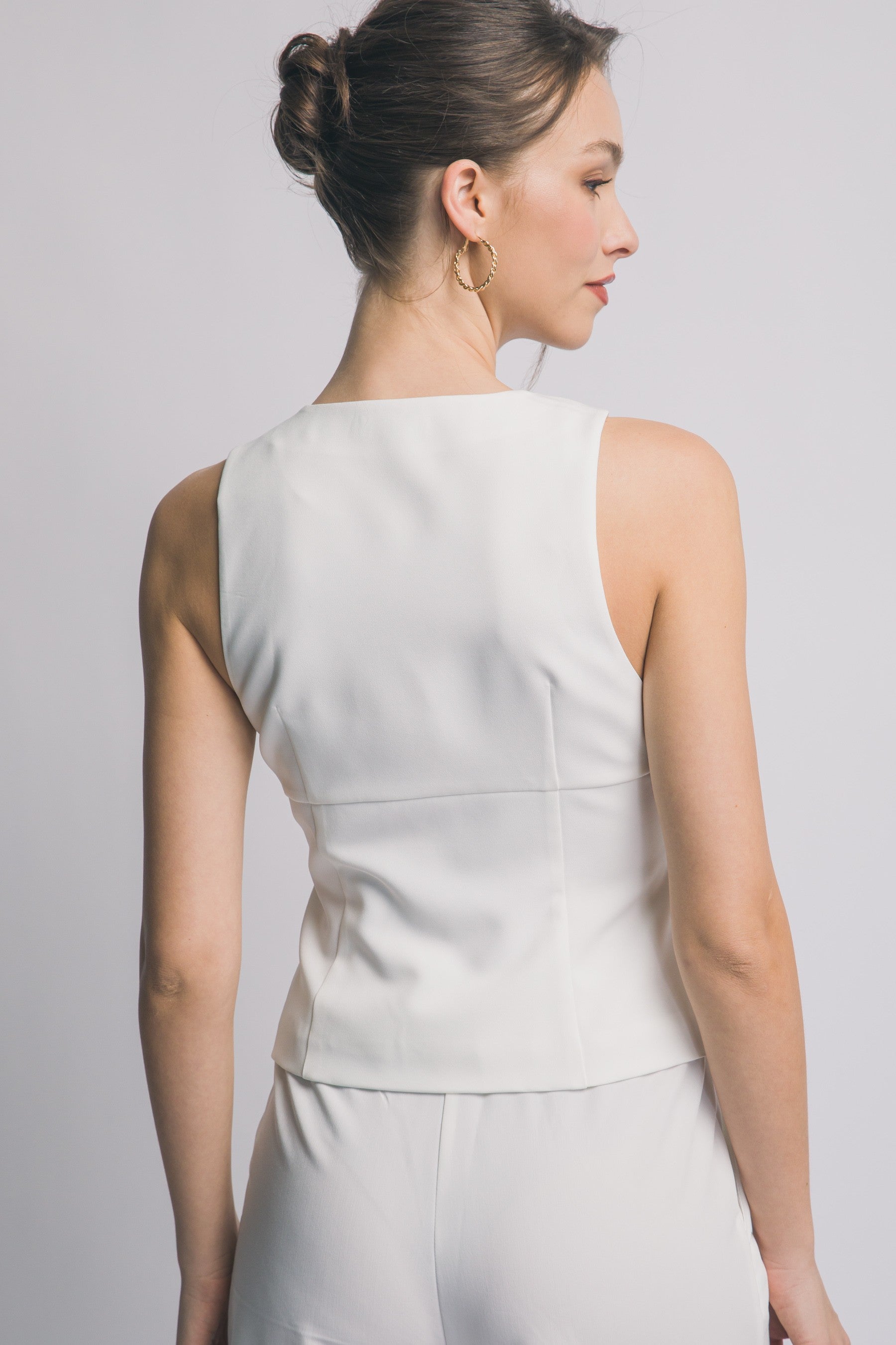 Chaleco  con botones negros