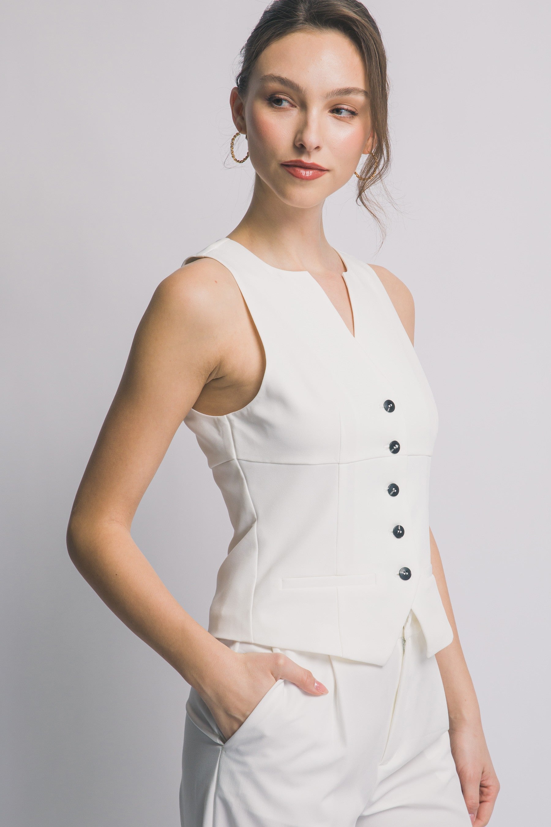 Chaleco  con botones negros