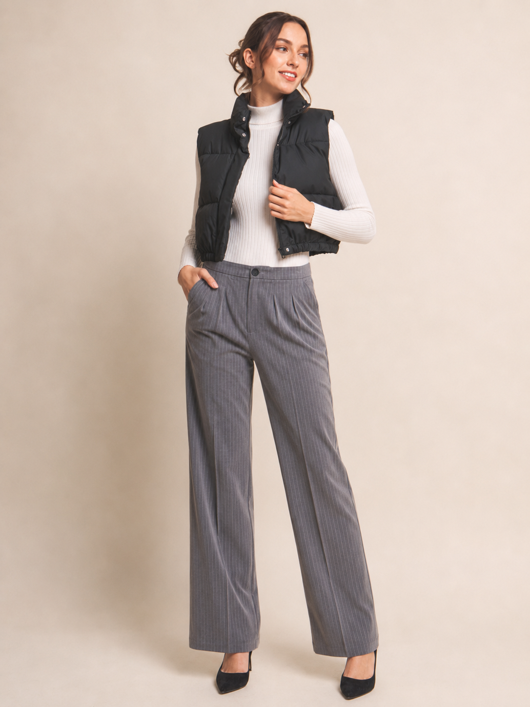 Chaleco acolchado con cuello alto y ajuste en cintura