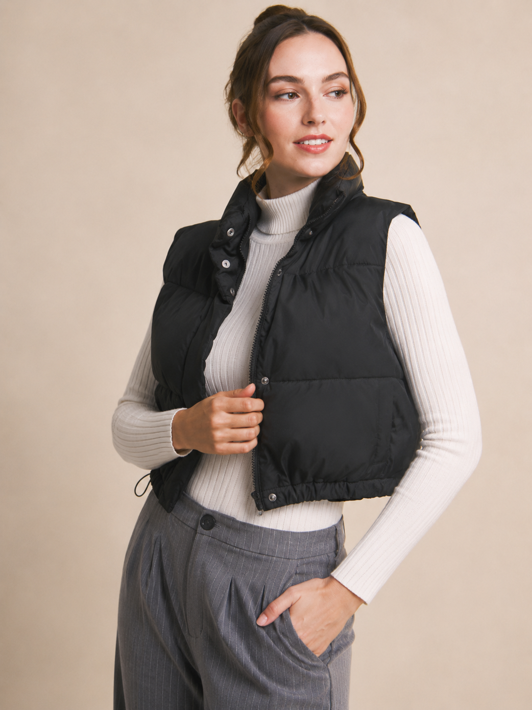Chaleco acolchado con cuello alto y ajuste en cintura
