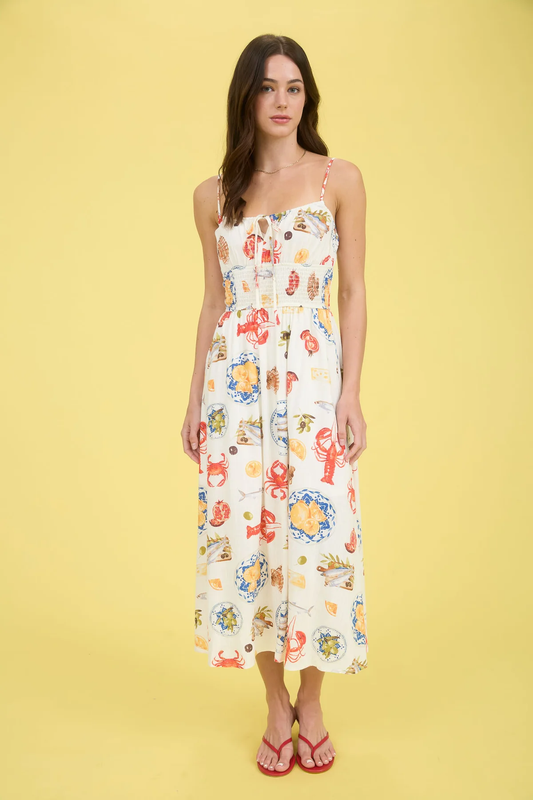 Vestido midi con estampado y tirantes delgados