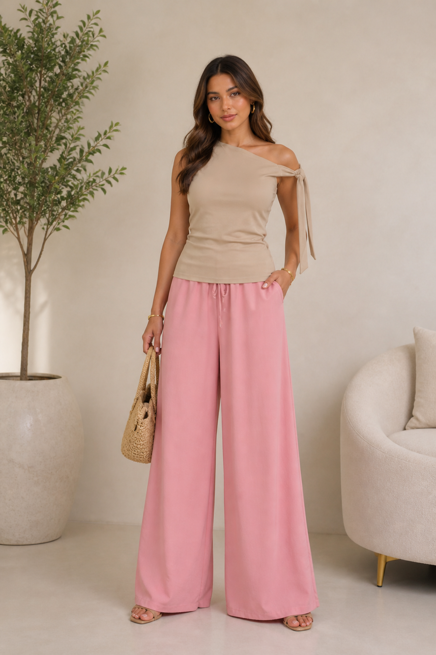 Blusa asimétrica con detalle de lazo en hombro