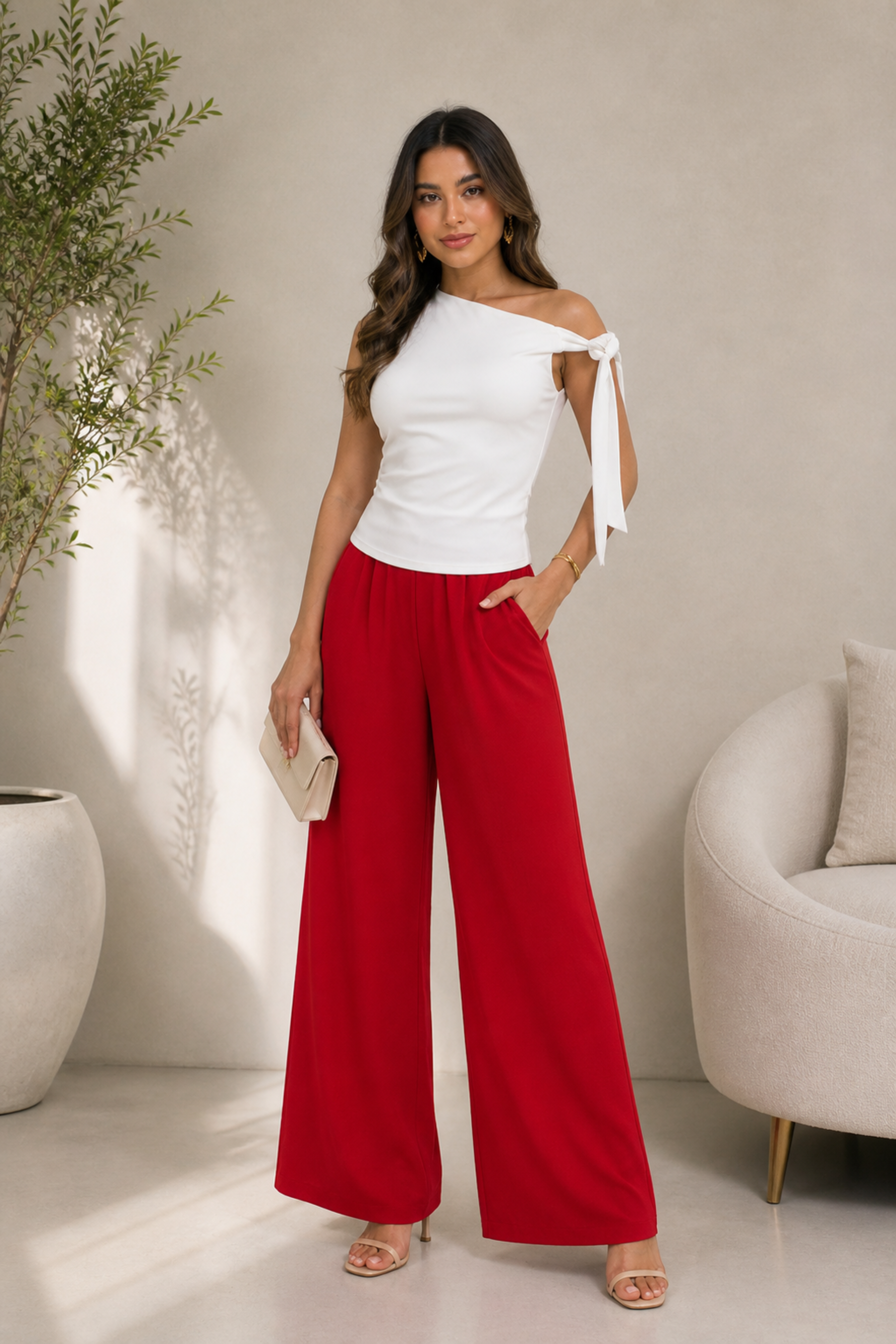 Blusa asimétrica con detalle de lazo en hombro