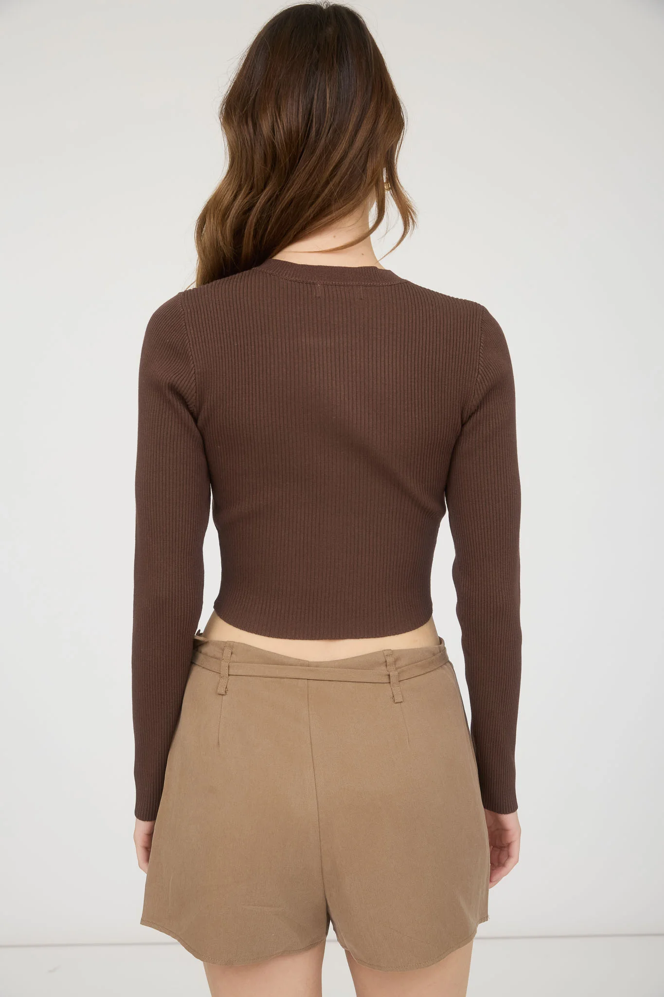 Blusa manga larga corte ajustado con botones