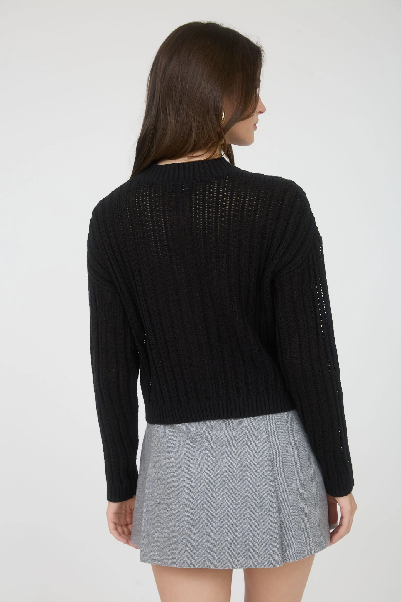 Suéter tejido abierto con botones frontales