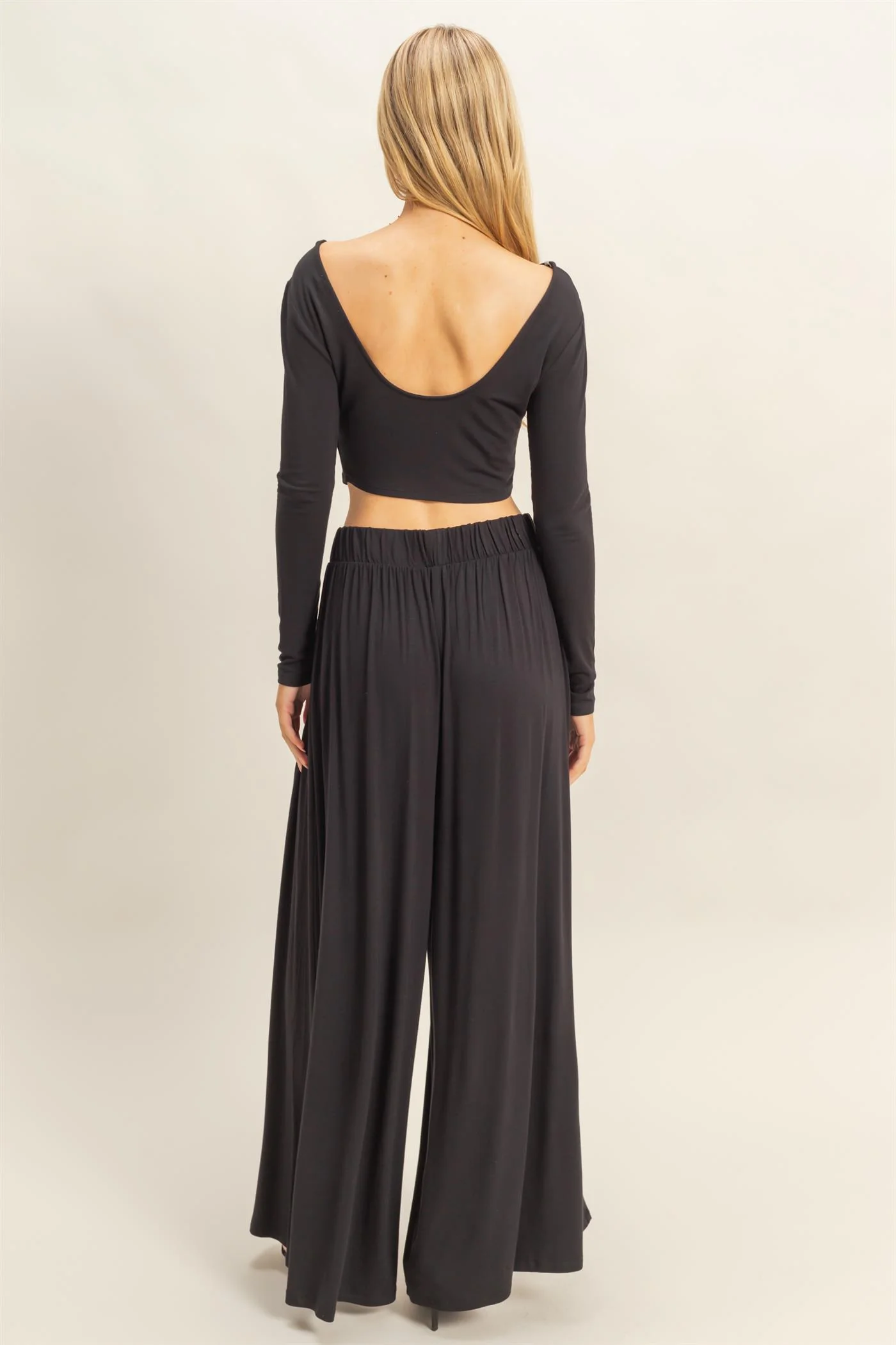 Conjunto de top corto de manga larga y pantalón largo