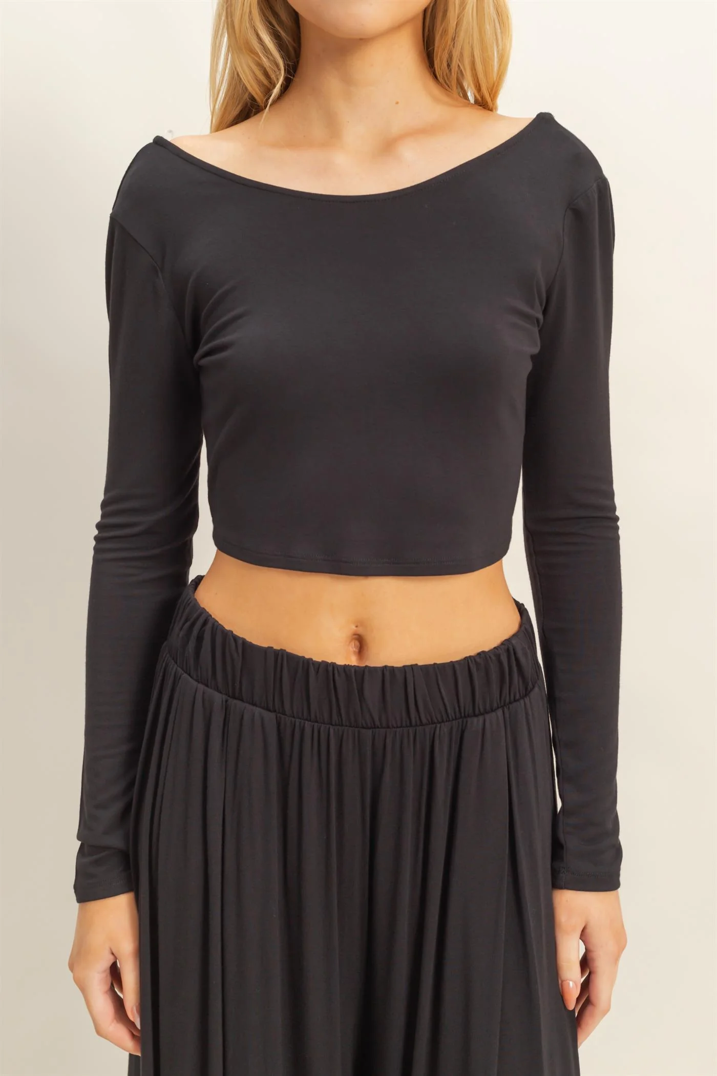 Conjunto de top corto de manga larga y pantalón largo